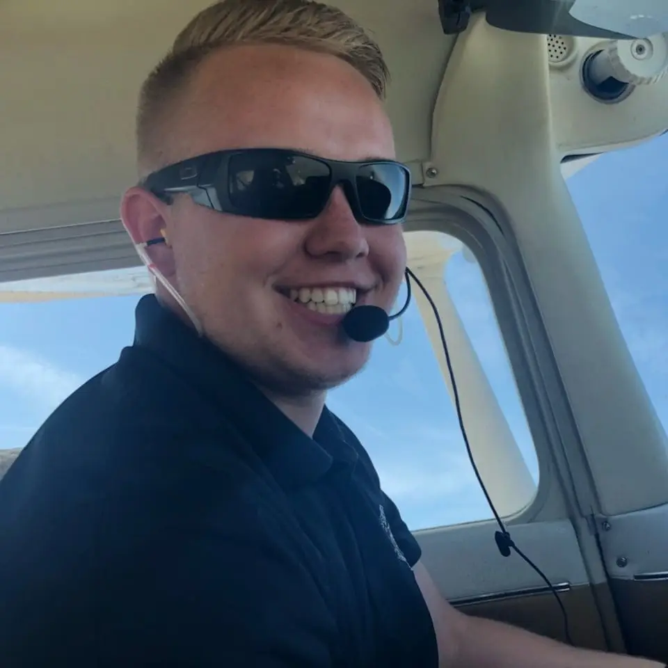 Pilot wearing a headset in the cockpit during professional flight training near Dayton, Ohio